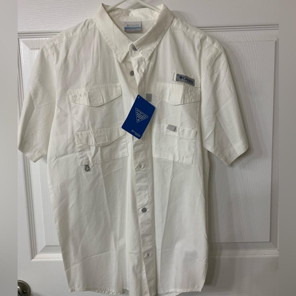 Columbia Performance Shirt. Brand new with tags. Never worn. Youth XL